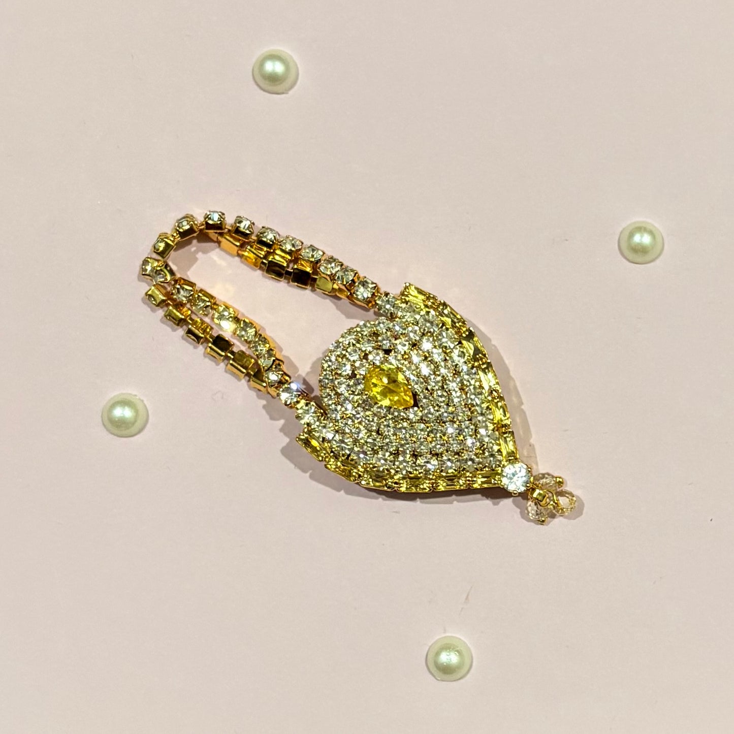 Gold AD Drop Shaped Purse, a miniature American Diamond teardrop purse for deity shringar and idol decoration