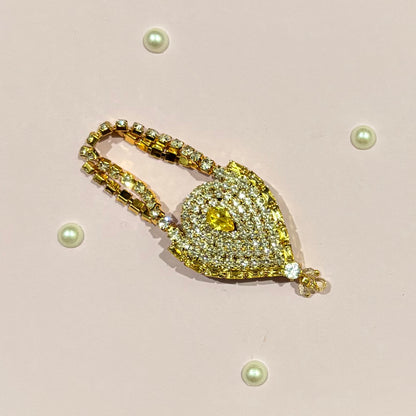 Gold AD Drop Shaped Purse, a miniature American Diamond teardrop purse for deity shringar and idol decoration