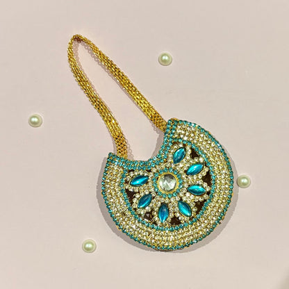 Sky blue AD Moon Shaped Purse (Big), a stone-studded crescent purse to adorn deity idols like Laddu Gopal and Radha Rani