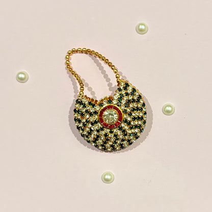 Green AD Moon Shaped Purse, a small American Diamond crescent purse for deity idol shringar and festive decoration