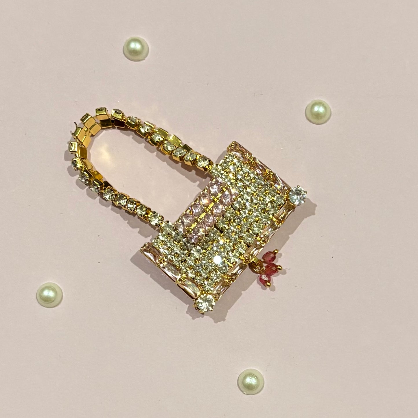 Baby pink AD Rectangular Purse, a miniature gold-tone American Diamond purse for deity shringar and pooja decoration