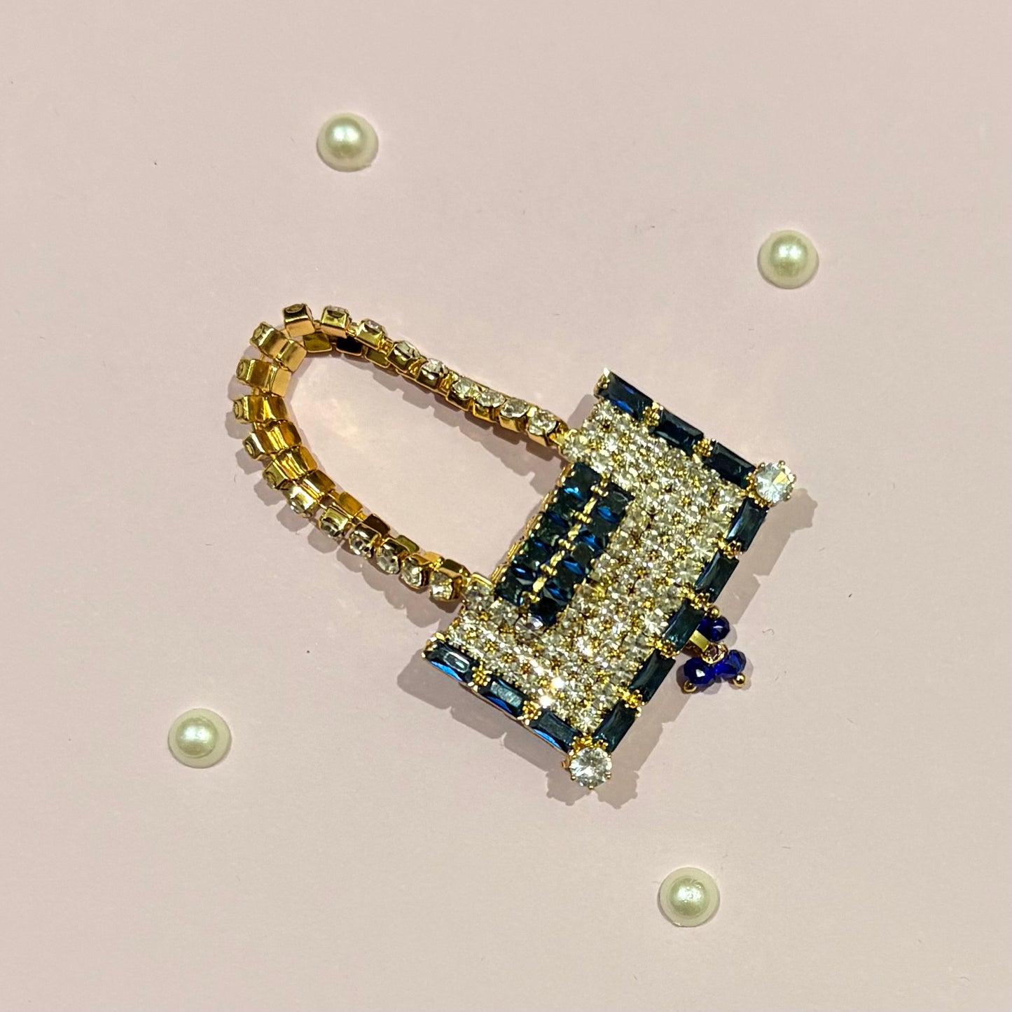 Dark blue AD Rectangular Purse, a miniature stone-studded purse to decorate deity idols such as Thakur Ji and Radha Rani
