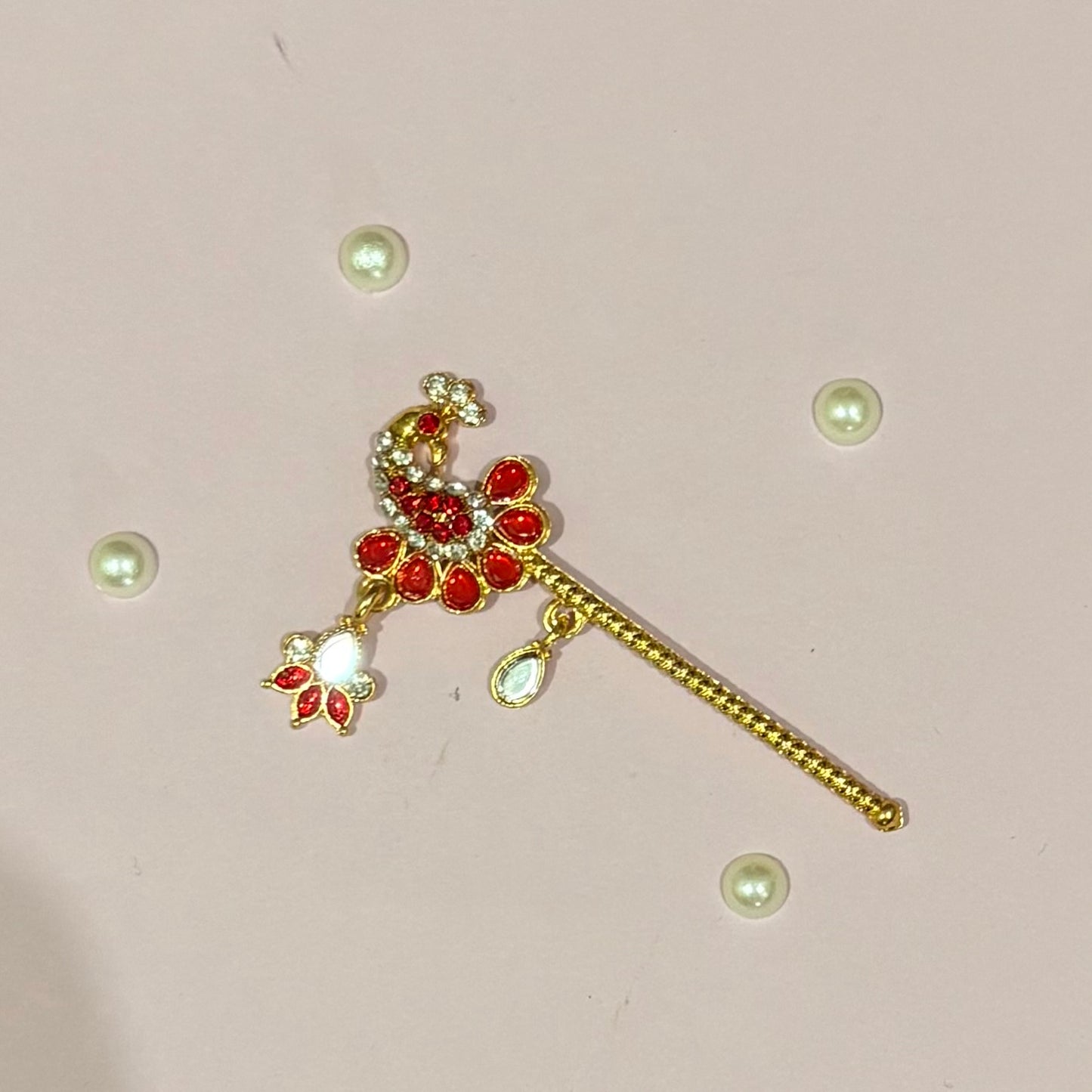 Red Bansuri, a miniature gold-tone decorative flute to adorn deity idols like Laddu Gopal and Krishna for shringar and decoration