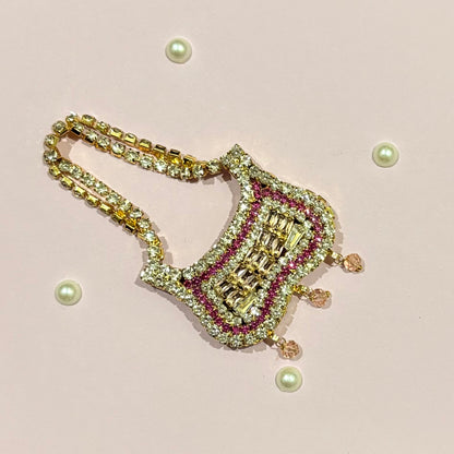 Pink Butterfly AD Purse, a miniature gold-tone American Diamond purse for deity shringar and pooja decoration