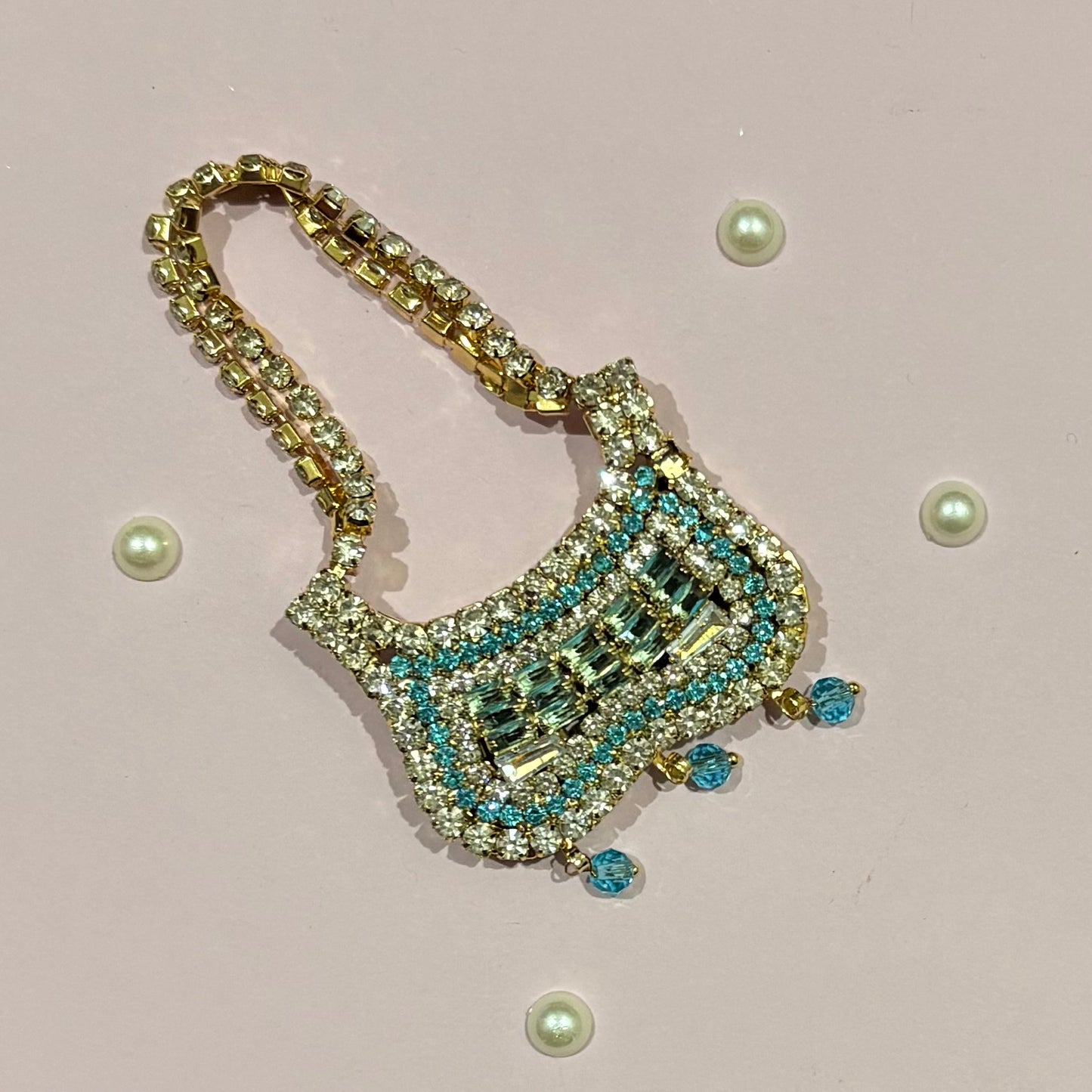 Sky blue Butterfly AD Purse, a miniature stone-studded purse to adorn deity idols like Laddu Gopal and Radha Rani