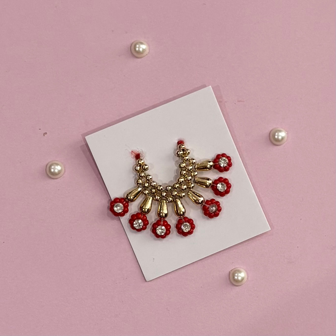 Red Mala, a handcrafted gold-tone deity necklace to adorn idols like Radha Rani and Laddu Gopal for shringar and pooja decor