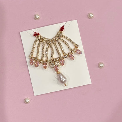 Pink Mala, a handcrafted gold-tone deity necklace to adorn idols like Radha Rani and Laddu Gopal for shringar and pooja decor