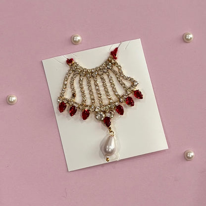 Red Mala, a handcrafted gold-tone deity necklace to adorn idols like Radha Rani and Laddu Gopal for shringar and pooja decor