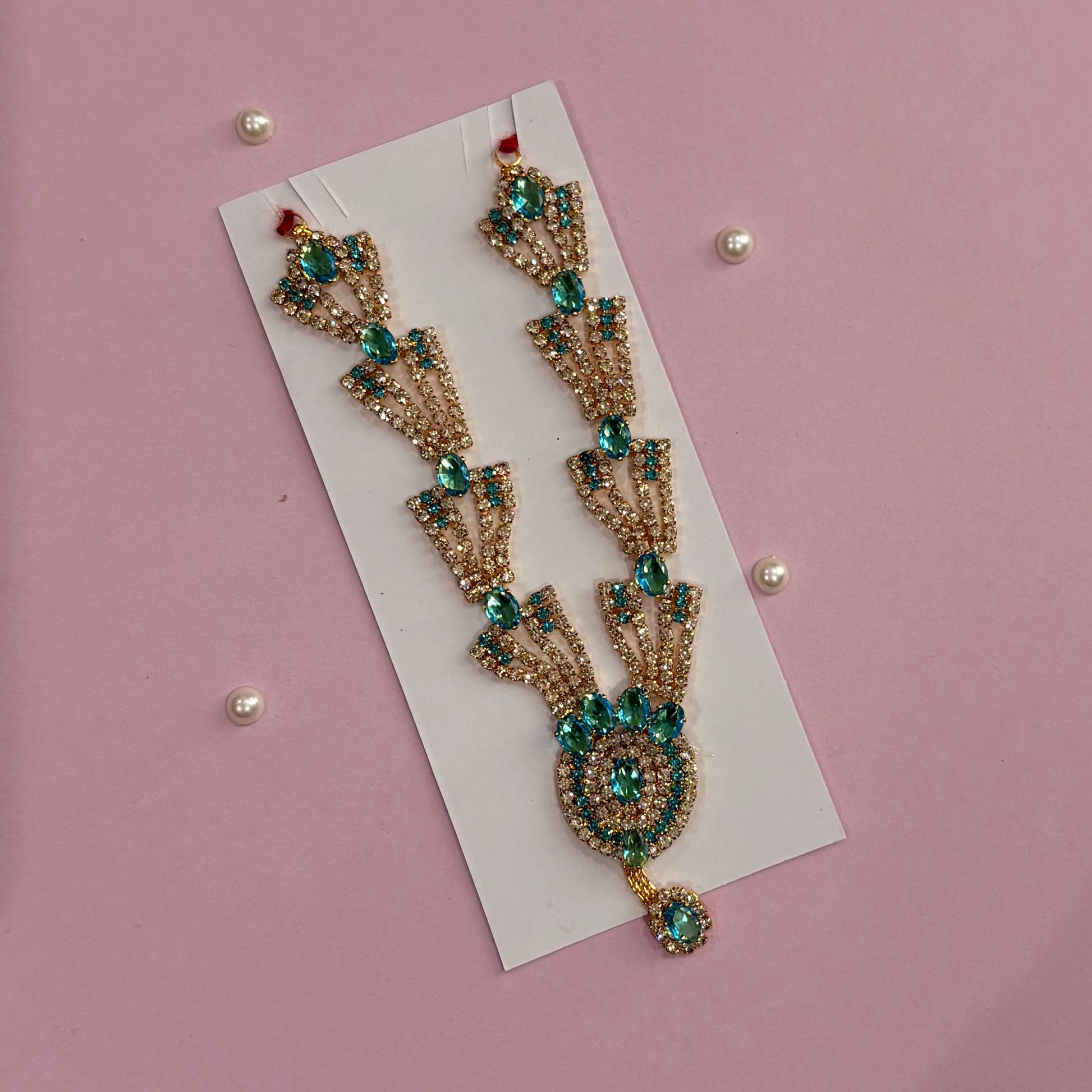 Sky blue Mala, a handcrafted gold-tone deity necklace to adorn idols like Radha Rani and Laddu Gopal for shringar and pooja decor