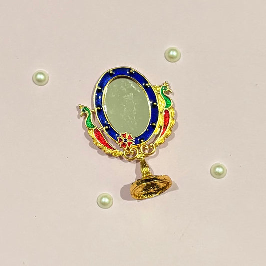 Miniature gold-tone metal Darpan (mirror) for deity seva, a handcrafted accessory to adorn idols like Radha Rani and Laddu Gopal