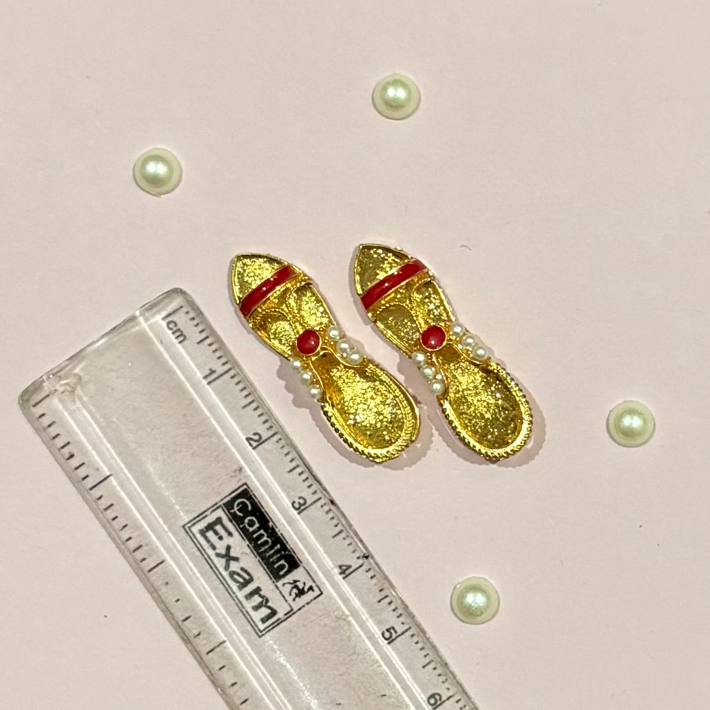 Decorative Sandal (paduka) for Thakur Ji and Laddu Gopal seva, crafted in a traditional gold-tone finish